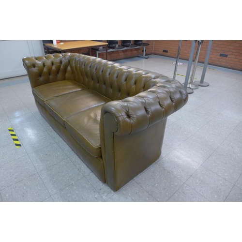 105 - A Chesterfield olive green leather settee, 75cms h, 206cms w, 82cms d