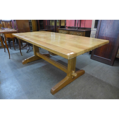 107 - An Arts and Crafts Cotswold School oak refectory table, 73cms h, 190cms l, 91cms w