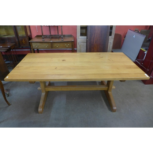 107 - An Arts and Crafts Cotswold School oak refectory table, 73cms h, 190cms l, 91cms w