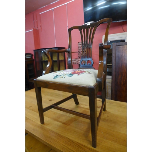 108 - A pair of George III style mahogany open armchairs