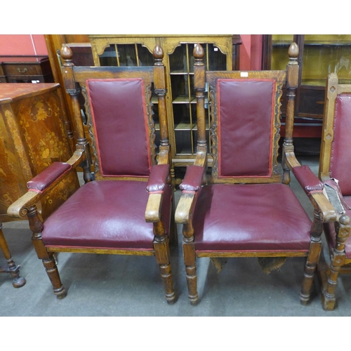 110 - A pair of similar Victorian carved oak and upholstered armchairs, 134cms h, 72cms w70cms d