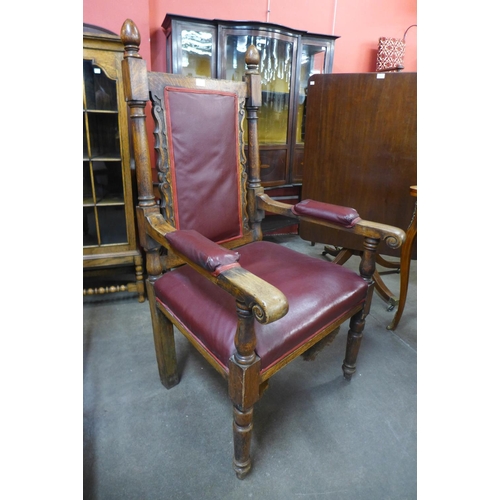 110 - A pair of similar Victorian carved oak and upholstered armchairs, 134cms h, 72cms w70cms d