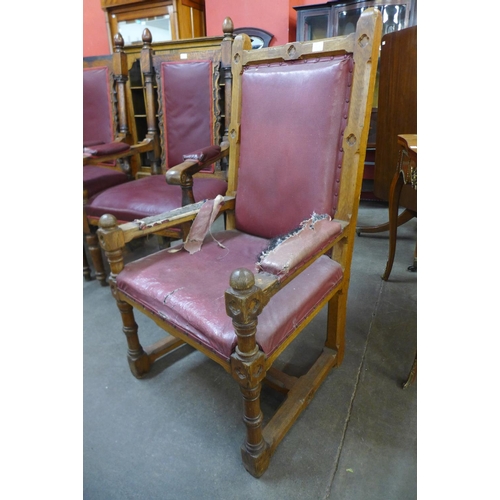 110a - A Victorian Gothic Revival oak and upholstered armchair, 117cms h, 64cms w, 60cms d