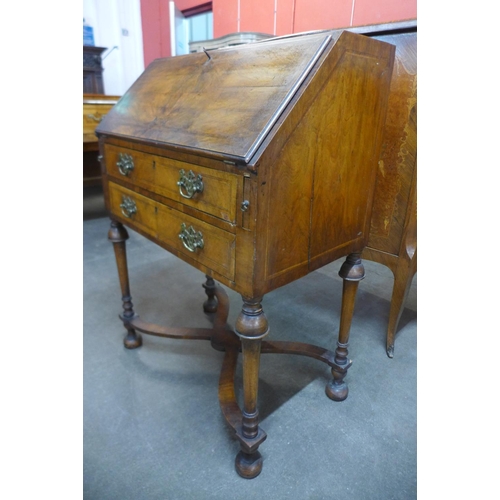 111 - A Queen Anne style walnut bureau de dame, 100cms h, 71cms w, 43cms d