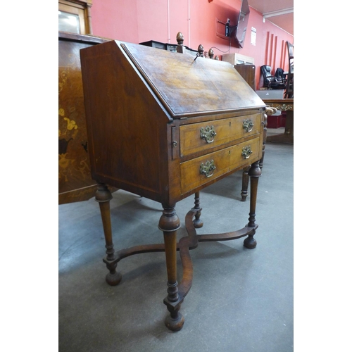 111 - A Queen Anne style walnut bureau de dame, 100cms h, 71cms w, 43cms d