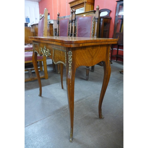 113 - A French Louis XV style mahogany, walnut and gilt metal mounted serpentine card table, 77cms h, 84cm... 