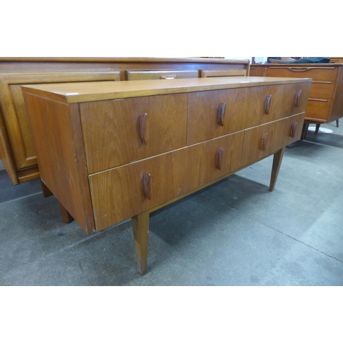 114 - A small teak sideboard