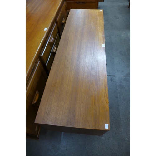 114 - A small teak sideboard