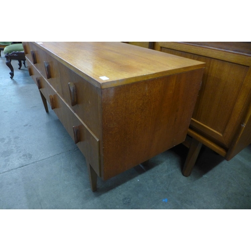 114 - A small teak sideboard