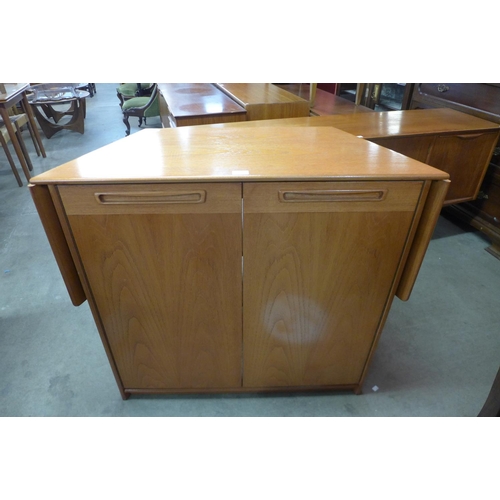 121 - A G-Plan Fresco teak drop leaf bar