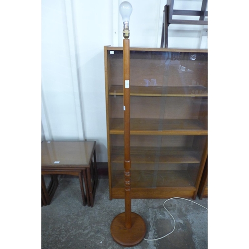 136 - A teak standard lamp