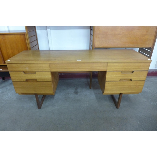 138 - A teak desk