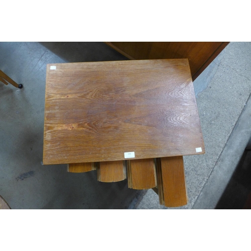 156 - A teak nest of tables