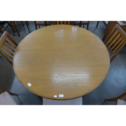 163 - A G-Plan Fresco teak extending dining table and six chairs