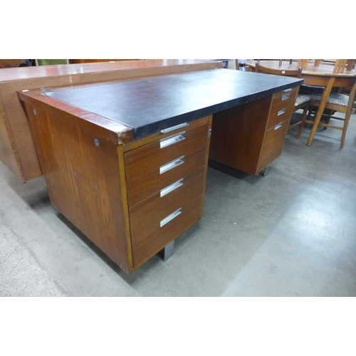 194 - A teak and chrome desk