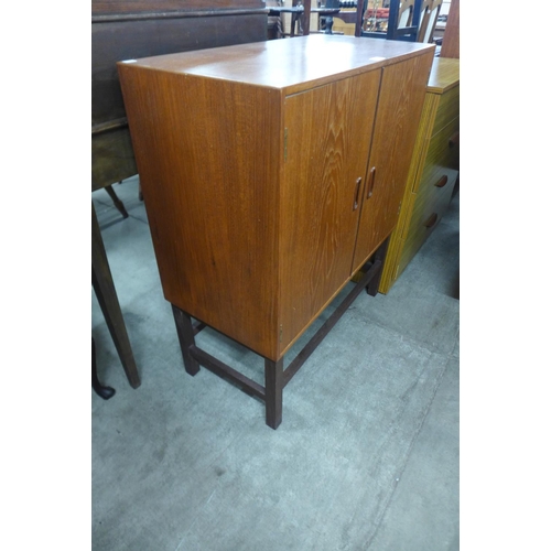 202 - A teak record cabinet