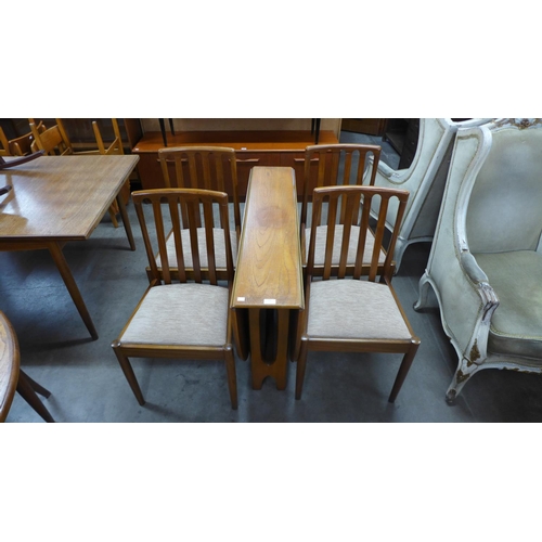 204 - A teak drop-leaf table and four chairs