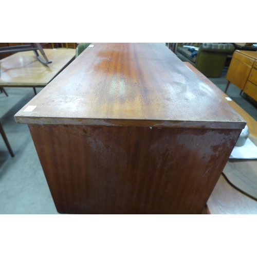 205 - A small teak sideboard