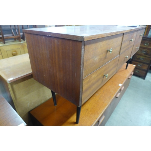 205 - A small teak sideboard