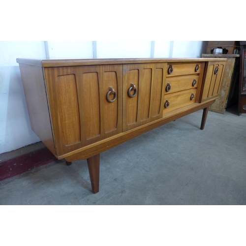 207 - A teak sideboard