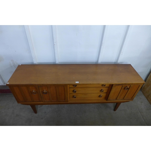 207 - A teak sideboard