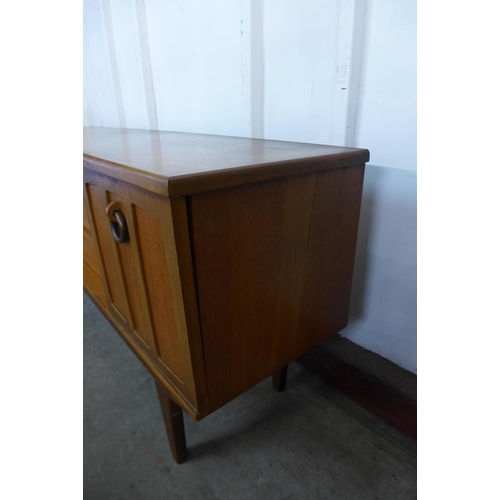 207 - A teak sideboard