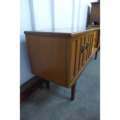 207 - A teak sideboard