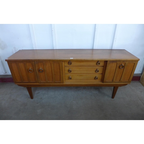 207 - A teak sideboard