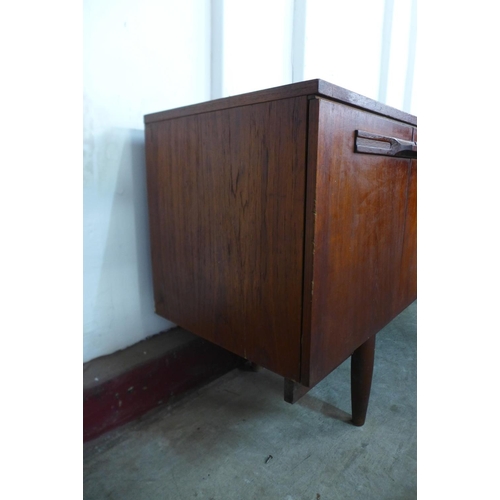 211 - A teak sideboard