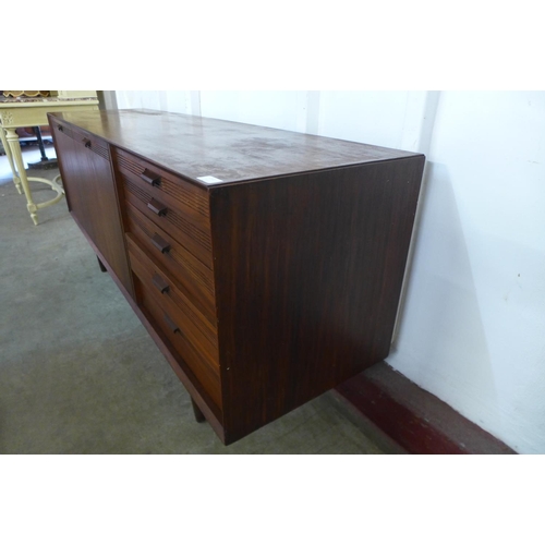 212 - A teak sideboard