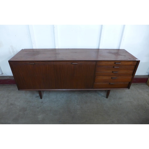 212 - A teak sideboard