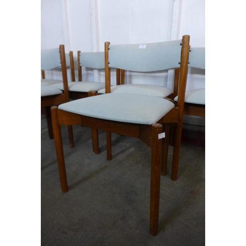 216 - A set of six teak dining chairs