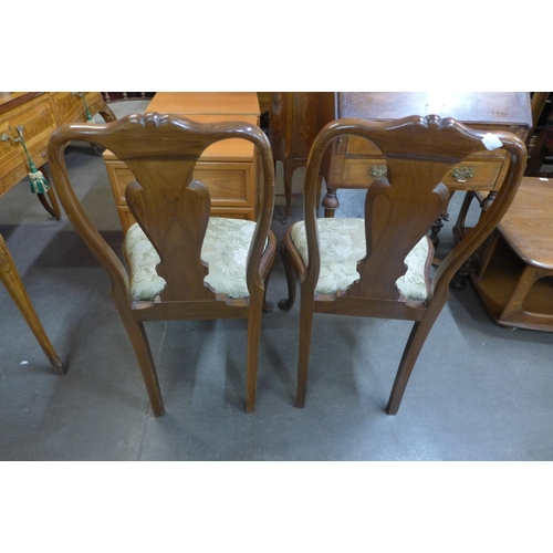 224a - A pair of George l style walnut chairs