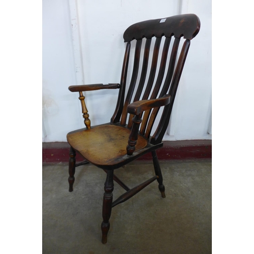 225a - A Victorian elm and beech farmhouse armchair