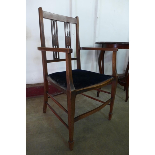 225d - An Edward VII mahogany music cabinet, an occasional table and an inlaid mahogany elbow chair