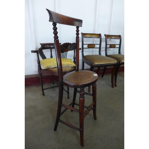 225e - A pair of Regency mahogany and brass inlaid chairs, a Victorian beech child's correction chair and a... 