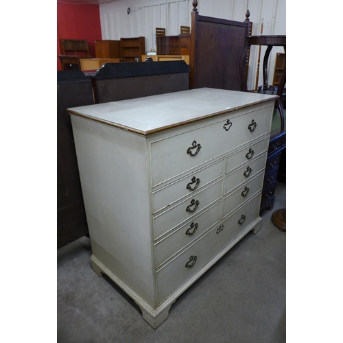 242 - A George III painted oak chest of drawers (top adapted to lift up)