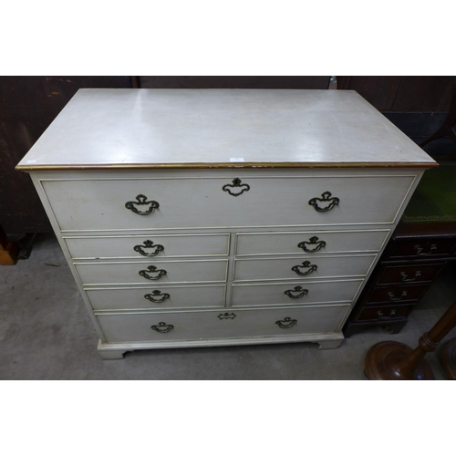 242 - A George III painted oak chest of drawers (top adapted to lift up)