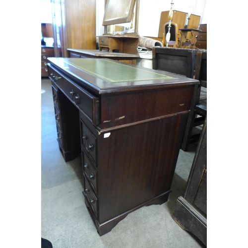 253 - A small mahogany pedestal desk