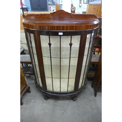 258 - A mahogany bow front display cabinets