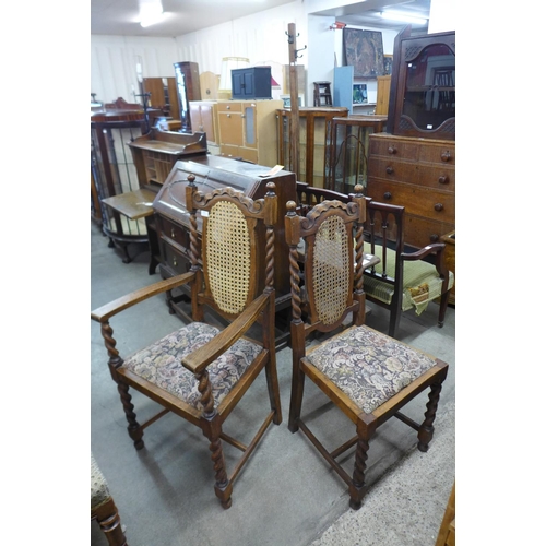 269 - A set of three oak barleytwist bergere dining chairs