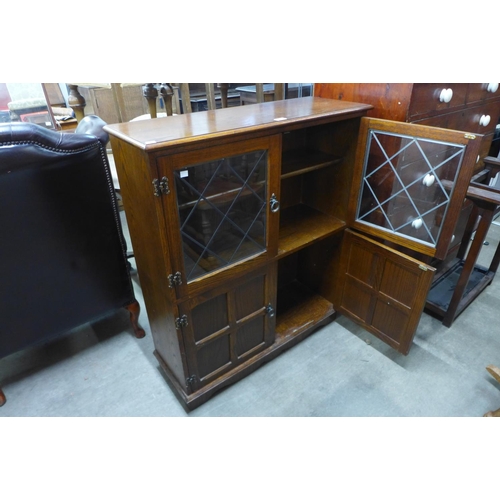 270 - An oak four door bookcase