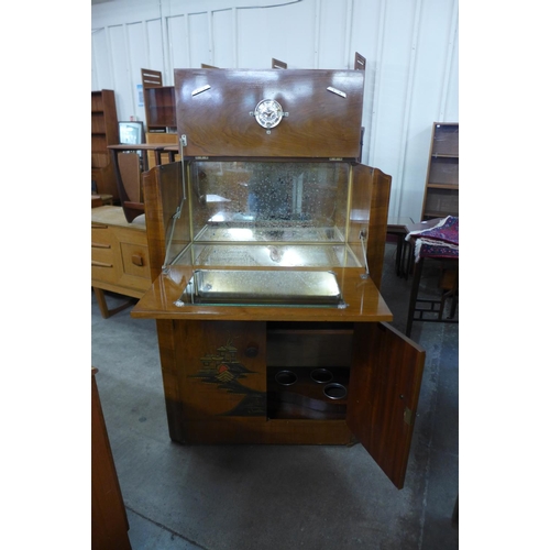 275a - A Japanned walnut cocktail cabinet