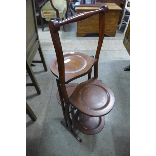 282 - An Edward VII inlaid mahogany folding cake stand