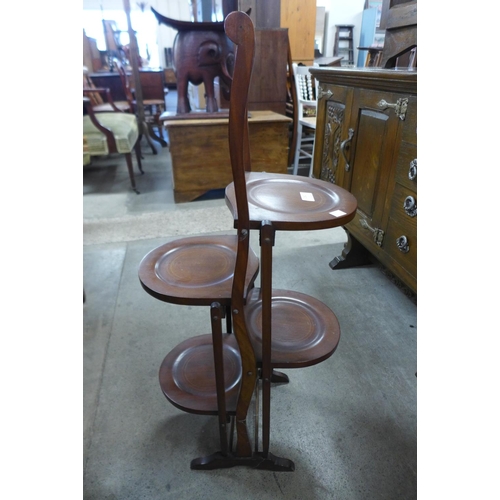 282 - An Edward VII inlaid mahogany folding cake stand