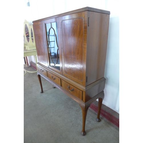 296d - A mahogany three door bookcase