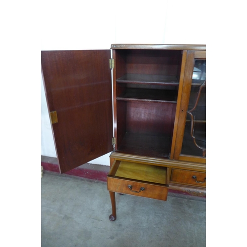 296d - A mahogany three door bookcase