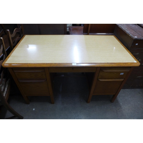 301 - An oak and Formica topped topped desk