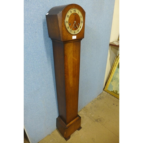 314 - An oak dwarf longcase clock