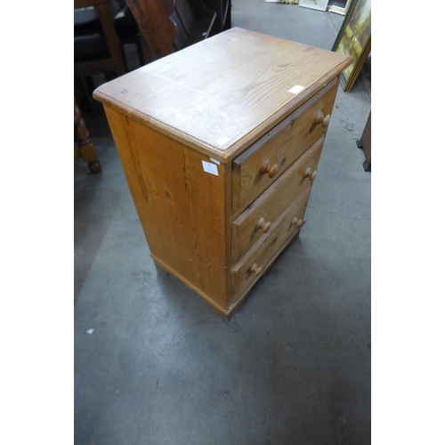 318 - A small pine chest of drawers